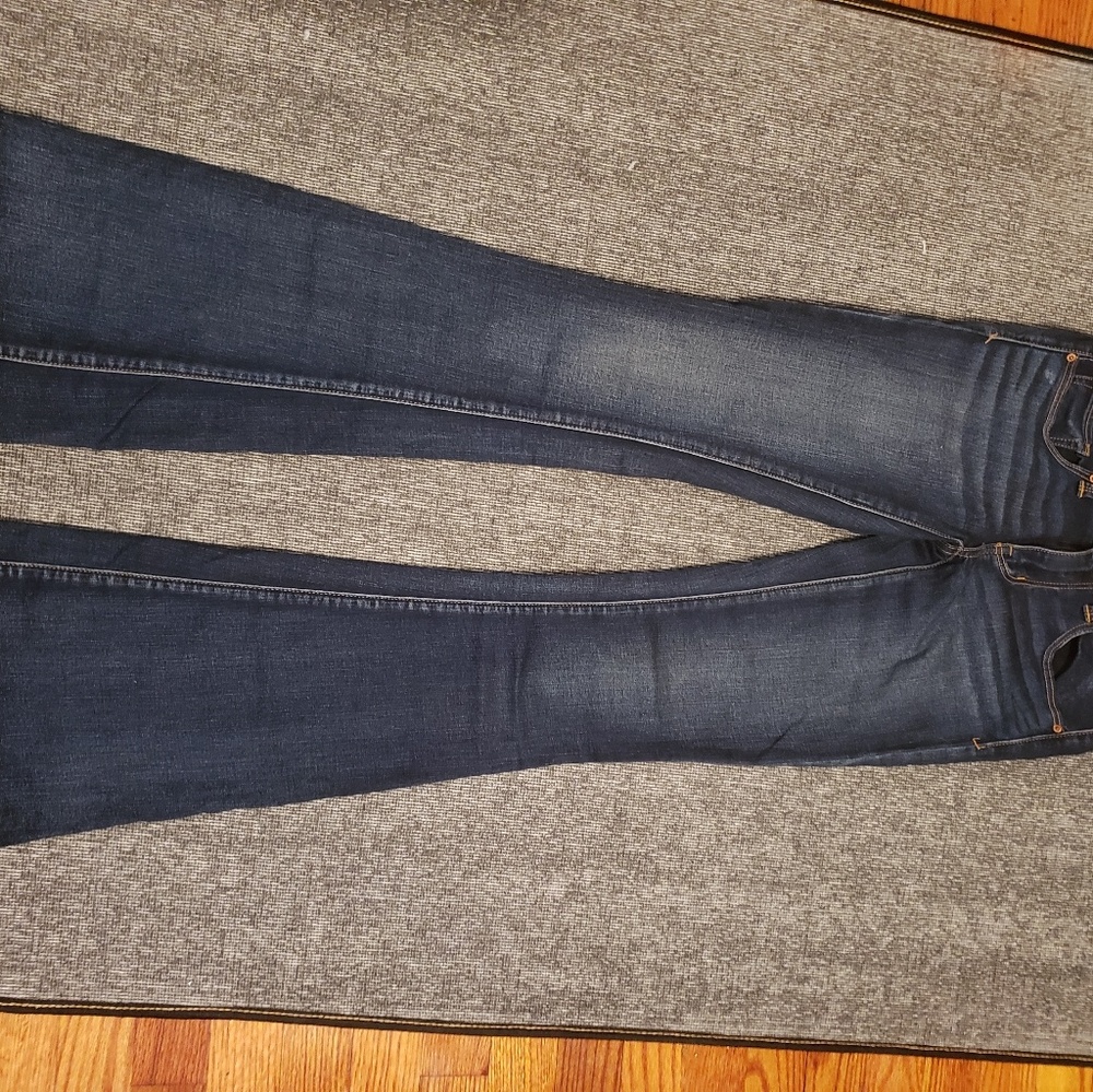 American Eagle boho artist flared dark jeans.